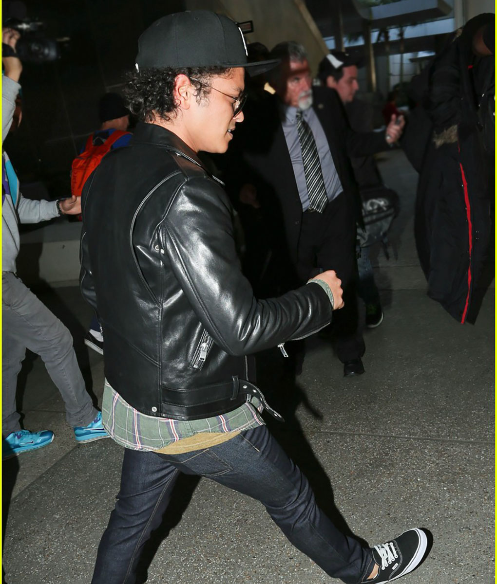 Bruno Mars Sports A LA Dodgers Hat As He Greets Fans Outside Of LAX